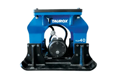 Hydraulic ground compactor working on jobsite soil